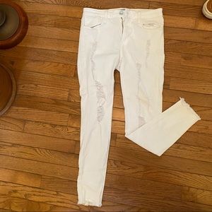 super soft/stretch mid-ride white ripped jeans